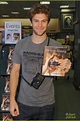 Full Sized Photo of keegan allen signs book for his fans 01 | Keegan ...