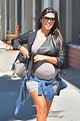So Cute! Kourtney Kardashian Holds Her Growing Baby Bump While Modeling ...