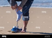 Taking off shoes hi-res stock photography and images - Alamy