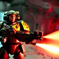 "A Space Marine futuristic soldier in the middle of the war in shooting ...