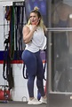 hilary duff flaunts her curves in a workout top and leggings during a ...