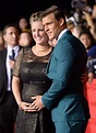 Alan Ritchson held the hand of his pregnant wife, Catherine. | The ...