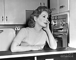 Carol Grace Matthau poses in her kitchen. 1956 Photograph by Anthony ...