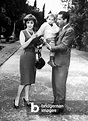 Image of Gina Lollobrigida with her son Milko Jr and her husband