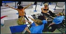 VIDEO: Watch two mums strip off in front of stunned passengers at ...