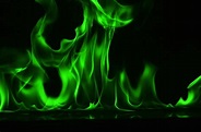 Premium Photo | Abstract green fire flames on black background