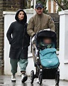 Tom Hardy braves the wet weather with wife Charlotte Riley