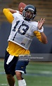 Quarterback Kevin Riley passes to a receiver during Cal Bears... News ...