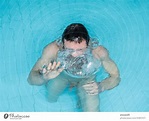 Nuede man in the pool - a Royalty Free Stock Photo from Photocase