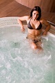 Premium Photo | Young woman in the hot tub