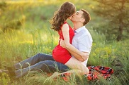 Hot young couple kissing in park | High-Quality People Images ...