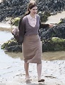 Lily James pulls up stockings on Guernsey set | Daily Mail Online