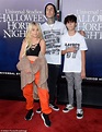 Travis Barker enjoys a family outing with his kids Landon, 14, and ...