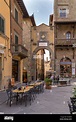 Street scene in the historic hilltop town of Cortona, in Tuscany, Italy ...