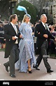 Poppy Delevingne (centre) and Charles Delevingne (right) arrive ahead ...