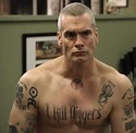 Henry Rollins Tattoos: What They Mean, And Why He Had Them - Inked Celeb