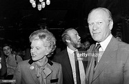 Betty Ford, David Hume Kennerly, and Gerald R. Ford attend a party at ...