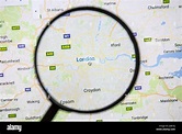 Map of London on Google Maps under a magnifying glass. London is the ...