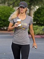 Elin Nordegren shows off her pert figure as she grabs a coffee with ...