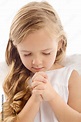 Little girl praying Stock Photo | Adobe Stock