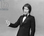 Image of French singer Jacques Dutronc singing during the recording of the