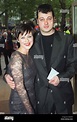Singer and actress Lisa Stansfield arrives with her husband Ian Devaney ...
