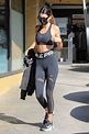 Kendall Jenner shows off her toned figure in Nike sports bra and ...