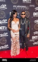 Asiah Azante (L) and rapper Kid Ink attends The Players Awards at the ...