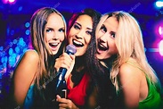 In karaoke bar Stock Photo by ©pressmaster 32902415