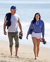 Josh Duhamel and his girlfriend Audra Mari smile side by side on a ...