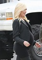 Pregnant Gwen Stefani displays her bulging bump at family Super Bowl ...