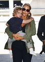 Elizabeth Berkley cradles her son Sky as she jets out of LAX with ...