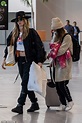 Cara Delevingne heads home from romantic getaway with girlfriend Minke ...