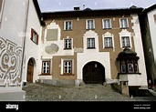The front of a typical Engadin-style house is seen in the center of S ...