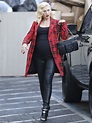 Gwen Stefani parades her VERY large bump in clingy top and tartan coat ...
