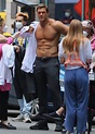 Alan Ritchson shows his muscles while on set filming the Amazon series ...