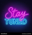 Neon sign stay tuned on brick wall background Vector Image
