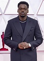 Daniel Kaluuya adds sparkle to his suit at the 2021 Oscars