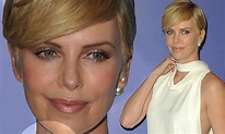 Charlize Theron attempts to hide an incision mark on her neck after it ...