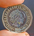 新1英鎊硬幣流通 - 香港文匯報