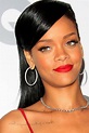 Rihanna's Tattoos and What They Mean - [2021 Celebrity Ink Guide]