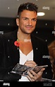 Peter Andre signs copies of his new album "Angels And Demons" and his ...