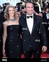 Jean Dujardin (R) and his wife Alexandra Lamy arrive on the red carpet ...