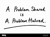 A Problem Shared is a Problem Halved handwritten on a white background ...