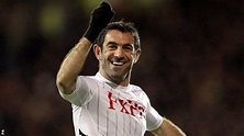 Giorgos Karagounis: Fulham midfielder agrees new deal - BBC Sport