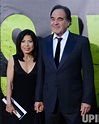 Photo: Oliver Stone and Sun-jung Jung attend the premiere of "Savages ...