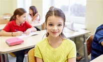 Student girl with group of school kids in class Stock Photo by ©Syda ...