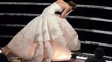 Oscars 2013: Jennifer Lawrence trips and falls up stairs video - Mirror ...