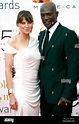 Peter Mensah and Lucy Lawless, at the Closing Ceremony of the 2010 ...