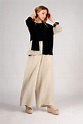 Natural, non-dyed linen trousers and hand knitted pure linen sweater is ...